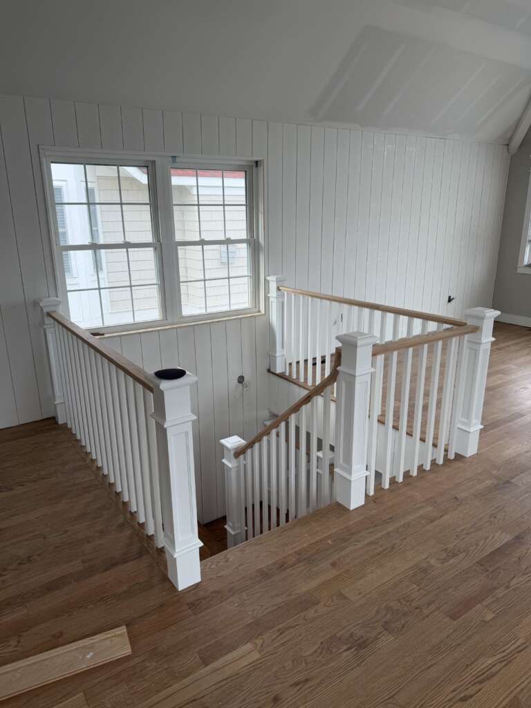 Custom indoor stairs and railing installation in a NY home.